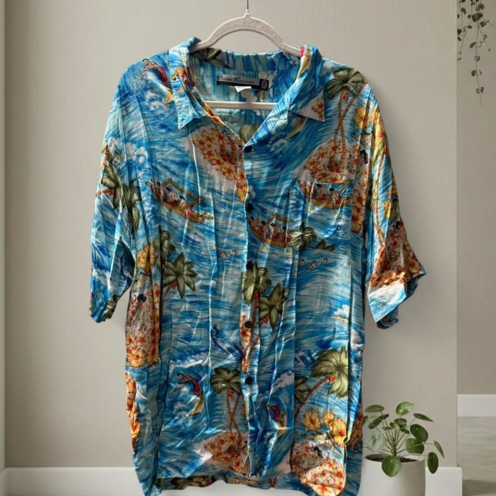 Ocean Current blue Hawaiian shirt with tropical print and button-up front